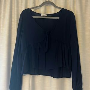Navy blue blouse, tie in front